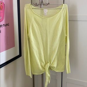 Yellow sweater.